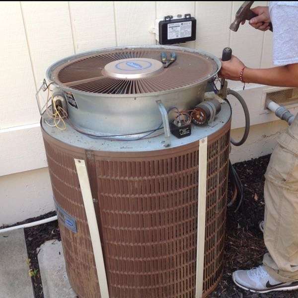 20 year old air conditioner being repaired in Pleasanton, CA