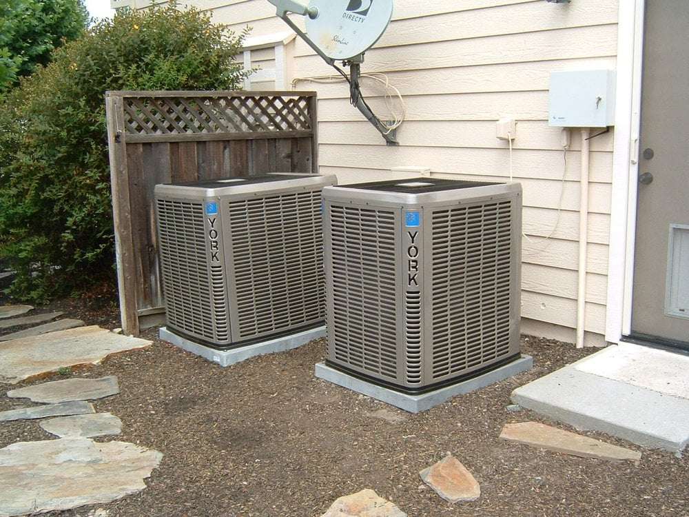 Two new York AC condensers installed outside a duplex in Dublin