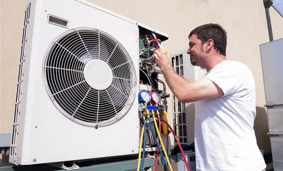 HVAC repairman fixes a broken ductless air conditioning compressor in Danville, California